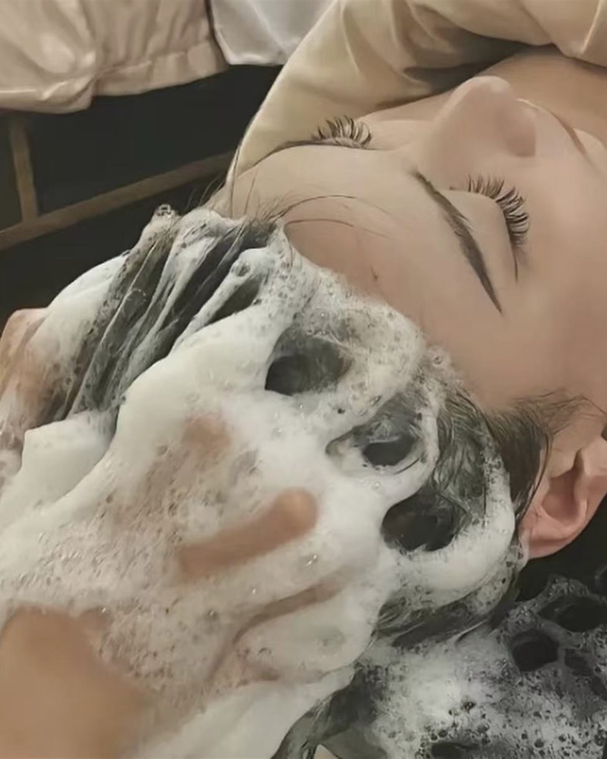Illustrative close-up of a gentle scalp care service